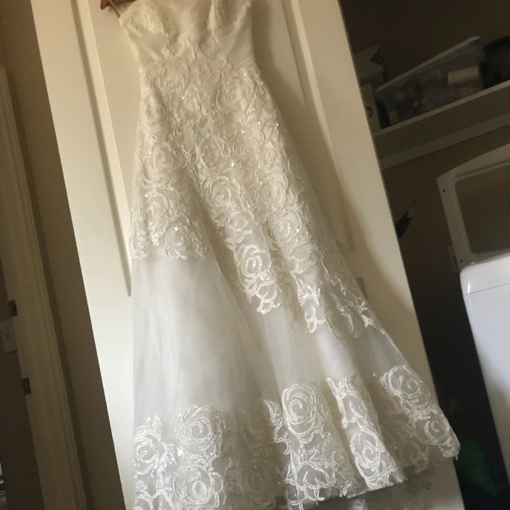 Maggie Sottero wedding dress. hand embroidered.